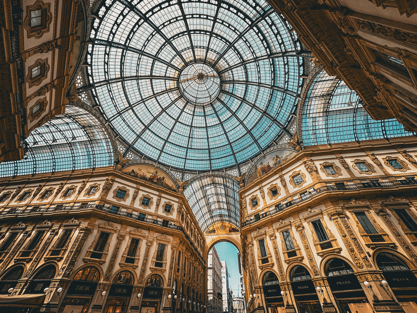 The Galleria Vittorio Emanuele II - Fine Art Print by Leslie Brashear Photography captures the landmark's ornate glass dome and lavish details, highlighting Milan’s iconic luxury architecture.